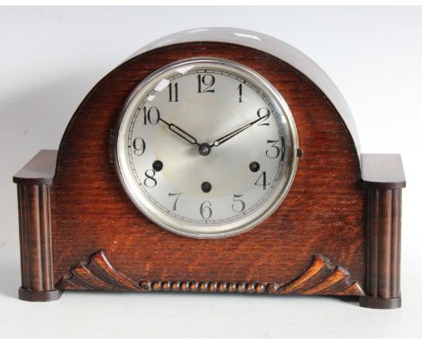 An Art Deco oak cased mantel clock, 8 day chiming movement, Arabic numerals 