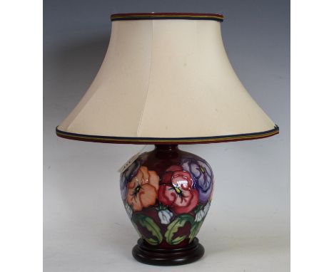 A Moorcroft Pansy pattern table lamp, 27cm high overall