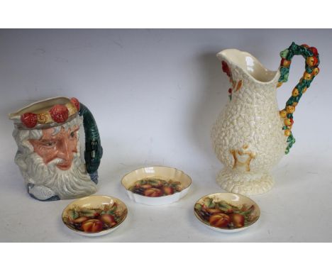 Ceramics - a Clarice Cliff celtic harvest jug, Royal Doulton Neptune character jug, Aynsley orchard gold trinket trays etc (5