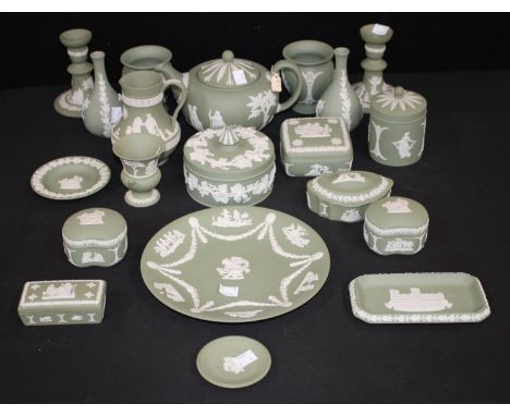 Wedgwood Green Jasperware including teapot, pair of urn vases, pair of candlesticks, assorted trinket pots and covers, plate,