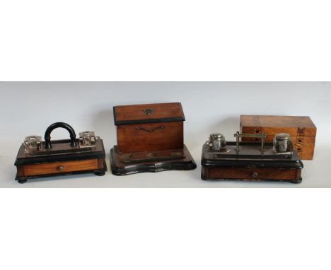 A Victorian walnut and ebonised inkstand, c.1890; others: a Victorian walnut and parquetry tea caddy, c.1870 (4)