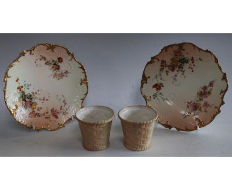 A pair of Royal Worcester rococo style dessert plates, printed and painted with summer flowers, on a blush ivory ground, 21cm