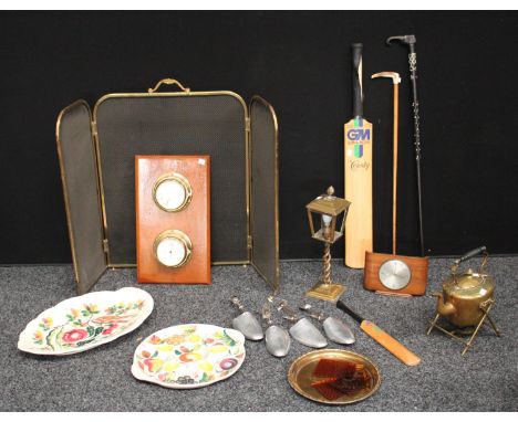 A Victorian brass spitit kettle; a brass table lamp as a lantern; a ships clock and barometer mounted as one; a cricket bat s