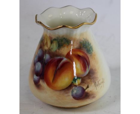 A Royal Worcester spreading cylindrical vase, with pie crust rim, painted by Roberts, signed, with peaches and grapes on a mo