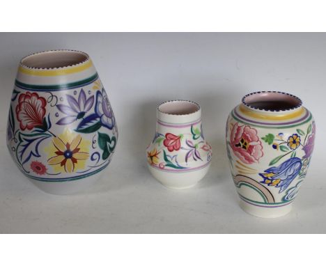 A Poole pottery ovoid vase, traditional pattern, 21cm high; others (3)