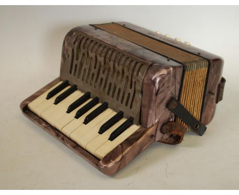 A Hohner Mignon miniature accordion