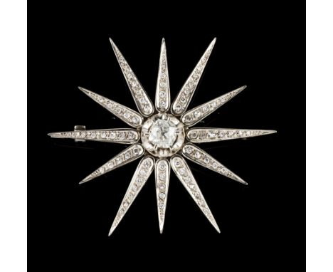 White goldShaped as a 12 point star set with 1 antique brilliant cut diamond (ca.0.90ct) colour K/L and purity P2 and various