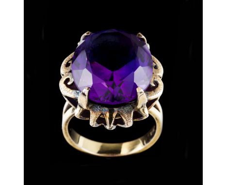 French goldPlain band of scalloped top set with one oval cut amethyst (ca. 17x14mm)France, ca.1950Maker's mark onlySize: 11 (