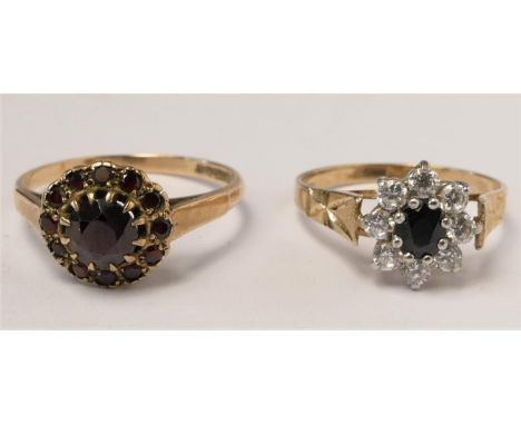 A 9ct gold and garnet cluster ring, R and a 9ct gold sapphire and white stone cluster ring, P, 4.5gm 