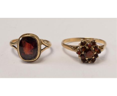 A 9ct gold and garnet cluster ring, Q and a single stone garnet ring, L, 4.1gm 