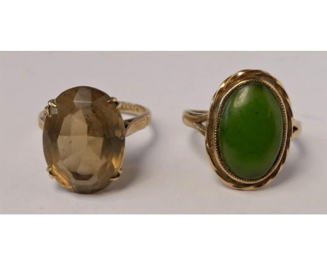 A 9ct gold and quartz dress ring, N, and a 9ct gold and nephrite jade dress ring O, 8.1gm