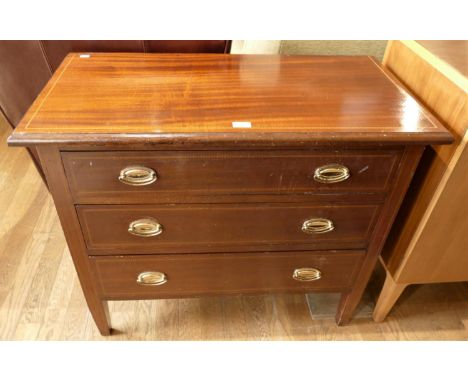 An Edwardian three height chest of drawers with brass drop handles. 91cm wide, 77cm tall, 45cm deep, together with two tripod