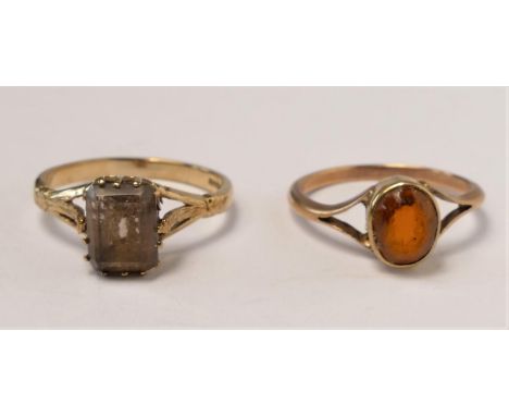 A 9ct gold and smokey quartz ring, M and a 9ct gold and glass ring, L, 3.8gm 