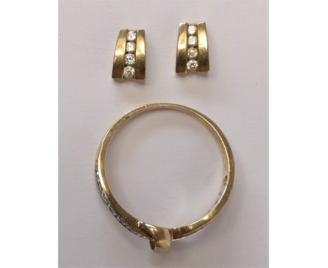 A 9ct gold and diamond half hoop ring, N 1/2 and a pair of diamond ear studs, 3.4gm 