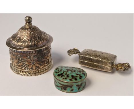 An embossed .800 standard silver lidded box, a silver and enamel box, stamped 925 and a silver sweet wrapper box, (3), 58gm g