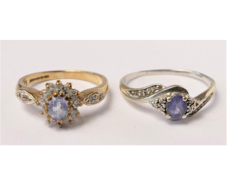 A 9ct gold sapphire and diamond cluster ring, diamond weight stated 0.15ct, N and another similar, R, 4.3gm