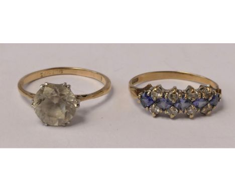 A 9ct gold tanzanite and diamond dress ring, M and a 9ct gold single stone ring, N, 3.5gm 