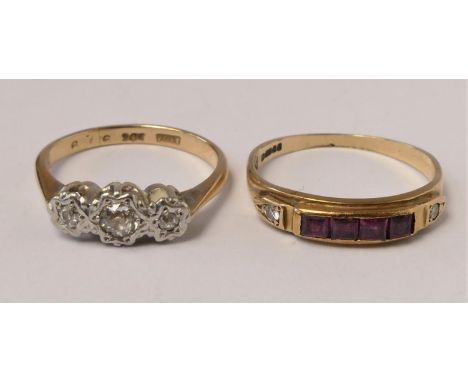 A 9ct gold ruby and diamond dress ring, N and a 9ct gold and three stone diamond ring J, 3.7gm 