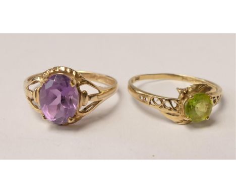 A 9ct gold and amethyst ring, O and a 9ct gold and peridot ring, O, 2.3gm 