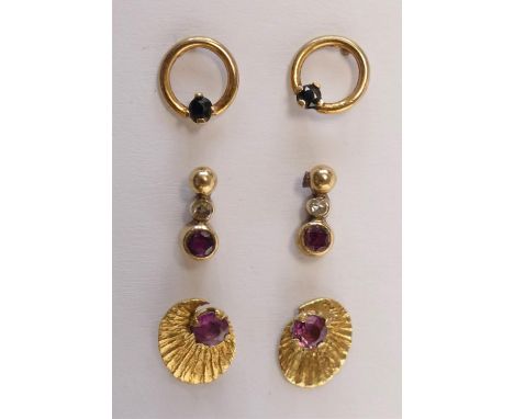 A 9ct gold pair of ruby ear studs, a diamond and ruby pair and another pair, 1.5gm 