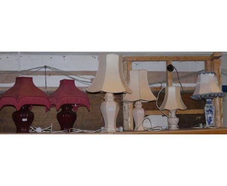 A pair of ceramic table lamps with shades, together with four other ceramic table lamps and shades. (6) 