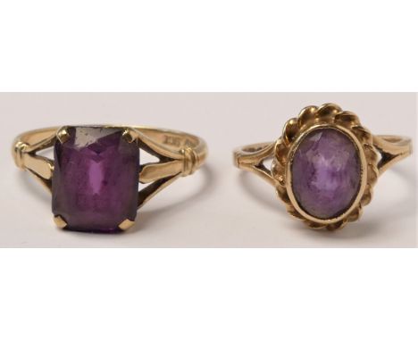 A 9ct gold single stone amethyst ring, claw set with a rectangular stone, ?, 2.9gm and a similar oval ring, the stone chipped