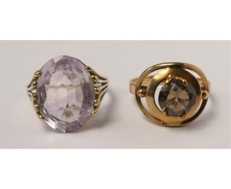 A 9ct gold and pale amethyst dress ring, O and a 9ct gold and smokey quartz ring, O, 5.8gm