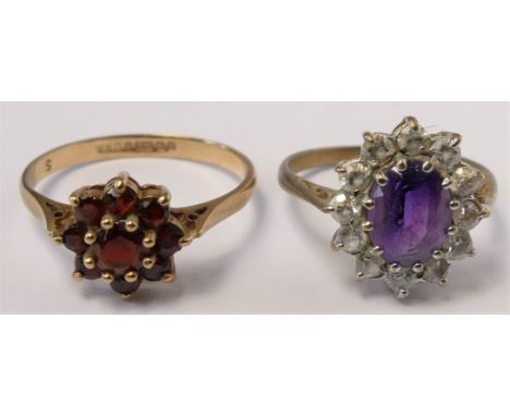 A 9ct gold garnet cluster ring, P, and an amethyst and paste cluster ring, K 1/2, 4.2gm. 