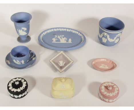 A collection of various coloured Wedgewood Jasperware, to include vases, lidded pots, cup &amp; saucer and a large platter. 