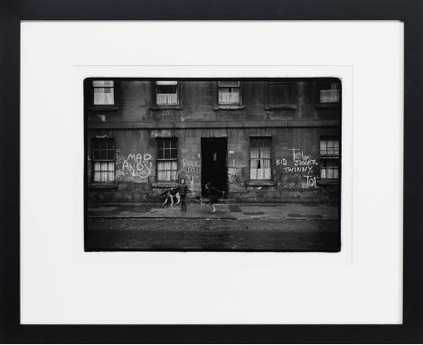* DAVID PEAT (SCOTTISH 1947 - 2012), SKIPPING THE DOG silver gelatin print mounted, framed and under glassimage size 24cm x 3