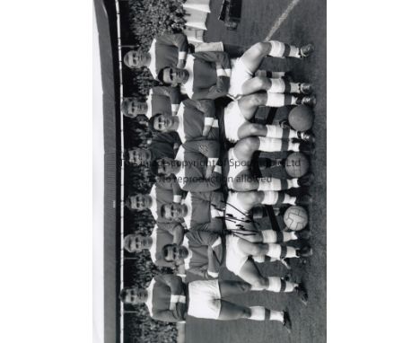 IAN GIBSON 1964       B/W 12” x 8” photo, showing Middlesbrough players posing for photographers prior to a First Division en