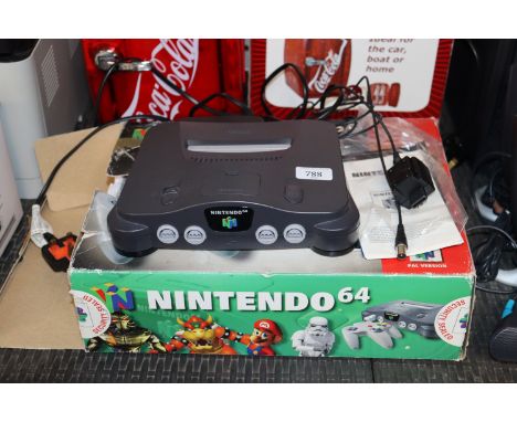 A Nintendo 64 with original box and instruction manual