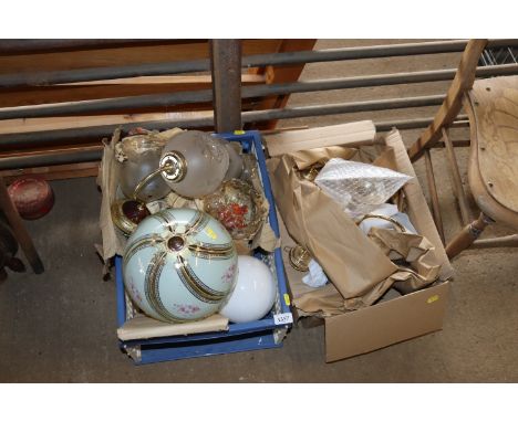A quantity of ceiling lamp shades, wall light brackets etc.