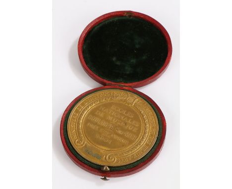 Early 20th Century French silver gilt commemorative medal by Alphee Dubois, with raised depiction of a classical nude playing