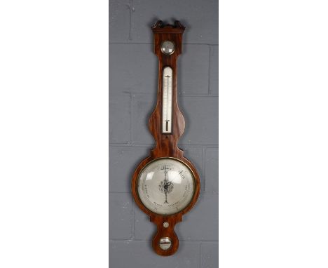 19th Century mahogany and boxwood strung wheel barometer, having swan neck pediment above silvered dials and register, 116cm 