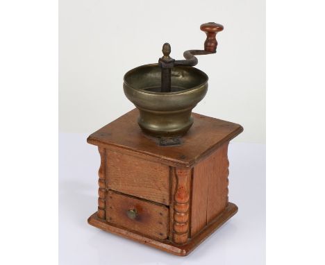 19th century oak coffee grinder, with brass hopper and drawer to the base, 29.5cm high