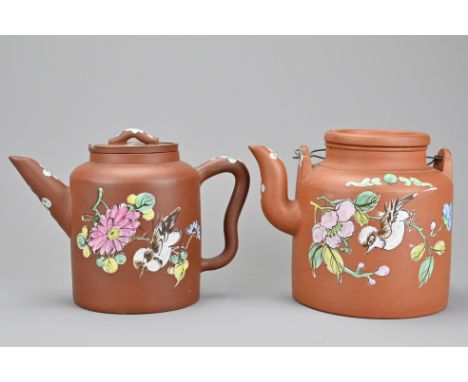 Two Chinese 19/20th century Yixing pottery teapots. Each decorated with enamel depicting birds and flowers. Each with makers 