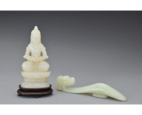 A Chinese jade carving of a seated Buddha on lotus pedestal on fitted wooden base. Together with a pale celadon dragon form b
