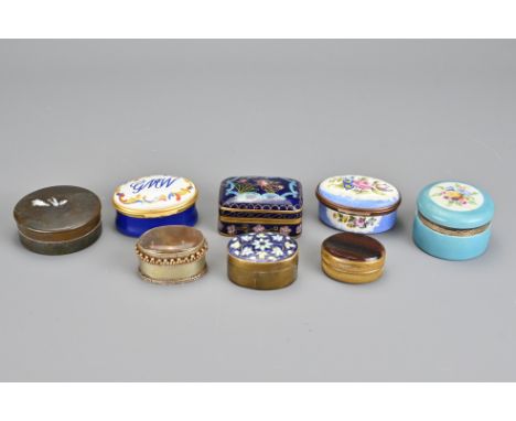 An assortment of eight powder boxes, to include Halcyon Days enamel, cloisonnŽ, stone, porcelain, and metal (8) 