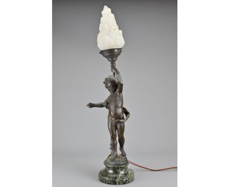 A 19th Century French Painted Spelter Table Lamp (after Auguste Moreau), depicting putti carrying torcheres on a marble base 