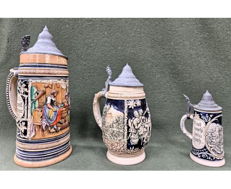 Three vintage relief decorated German pewter lidded ceramic beer steins. Largest Approx. 28cms H
all used appear reasonable