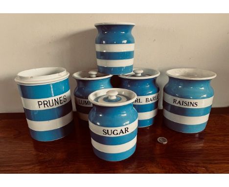 SIX PIECES OF TG GREEN CORNISH WARE STORAGE JARS
RAISINS JAR CHIPPED AND GLUED