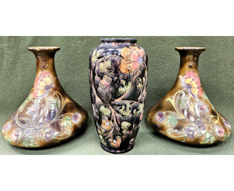 Pair of Morrcroft style tube lined floral decorated ceramic vases, plus another larger similar vase. Largest Approx. 21.5cms
