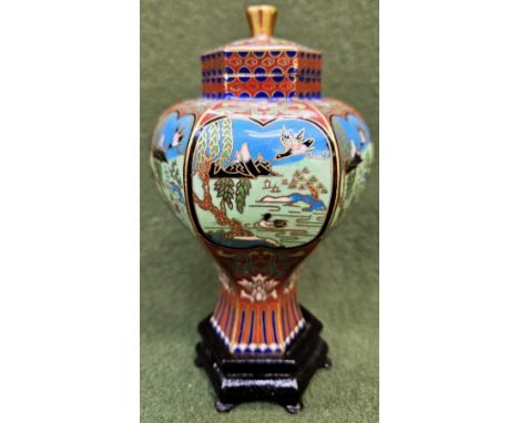 Pretty Japanese gilded cloisonné hexagonal ginger jar and cover. Approx. 16cms H
reasonable used condition