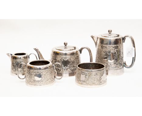 A George VI silver five piece tea service chased with with flowers and foliate band with vacant central cartouches, comprisin