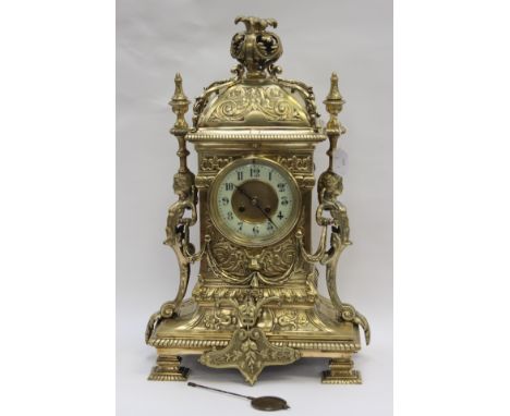 Large brass French late 19th Century mantle clock Regency style, with Arabic numerals