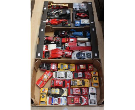 Three trays of modern diecast vehicles by Bburago, Maisto etc to include rally cars