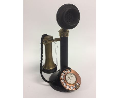 An early stick telephone, having brass and bakelite earpiece (not in working order)