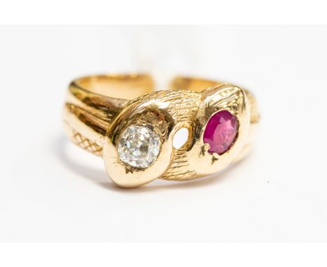 A Victorian ruby and diamond snake ring, double head snakes set ruby and old cut diamond, diamond approx 0.30 carat, size S, 