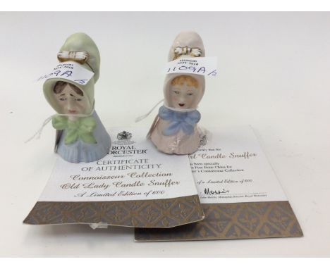 Two Royal Worcester limited edition candle snuffers of two bust figures of ladies dressed in bonnets, a young girl and old la